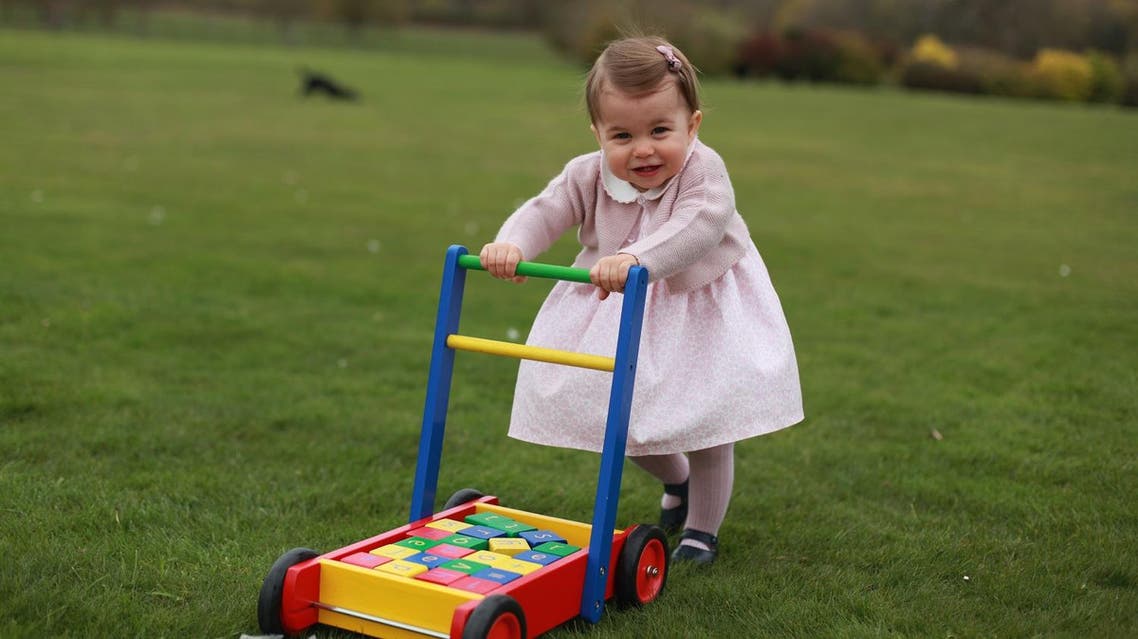 In this undated handout photo released on Sunday, May 1, 2016 by Kensington Palace, Britain's Princess Charlotte poses for a photograph, at Anmer Hall, in Norfolk, England. The princess will celebrate her first birthday on Monday. (Kate, the Duchess of Cambridge/Kensington Palace via AP)