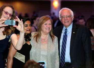 Democratic U.S. presidential candidate Bernie Sanders and his wife Jane (2nd R) attend the White House Correspondents' Association annual dinner in Washington, U.S. April 30, 2016. REUTERS