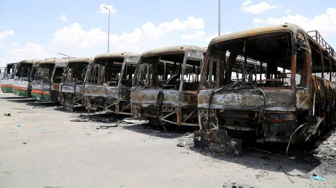 Buses, which witnesses said were burnt by workers from construction company Saudi Binladin Group in a protest over delayed wages, are seen in Mecca, Saudi Arabia May 1, 2016. REUTERS