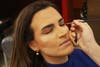 Al Arabiya's business anchor Rania Abi Nader getting her make-up done
