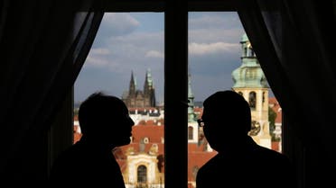 Czech Republic's foreign minister Lubomir Zaoralek, right, and Iran's vice president and nuclear chief, Ali Akbar Salehi look out at Prague's cityscape after a press conference in Prague, Czech Republic, Monday, May 2, 2016. (AP Photo/Petr David Josek)