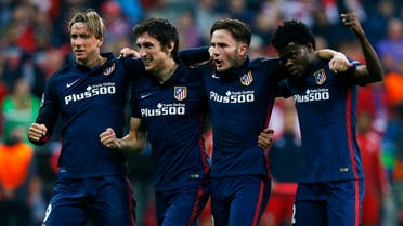 Atletico Madrid's Fernando Torres, Stefan Savic, Saul Niguez and Teye Thomas celebrate at the end of the game Reuters