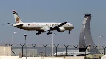  In this May 4, 2014 file photo, an Etihad Airways plane prepares to land at the Abu Dhabi airport in the United Arab Emirates. The United Arab Emirates' national carrier has formally submitted a document to the United States government rebutting allegations by U.S. carriers that it receives unfair subsidies. (AP)