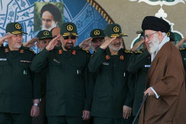 Supreme Leader Ayatollah Ali Khamenei, right, arrives at a Revolutionary Guard ceremony, while deputy commander of the Revolutionary Guard, Hossein Salami, second right, another other former commanders salute him in Tehran, Iran. (AP)