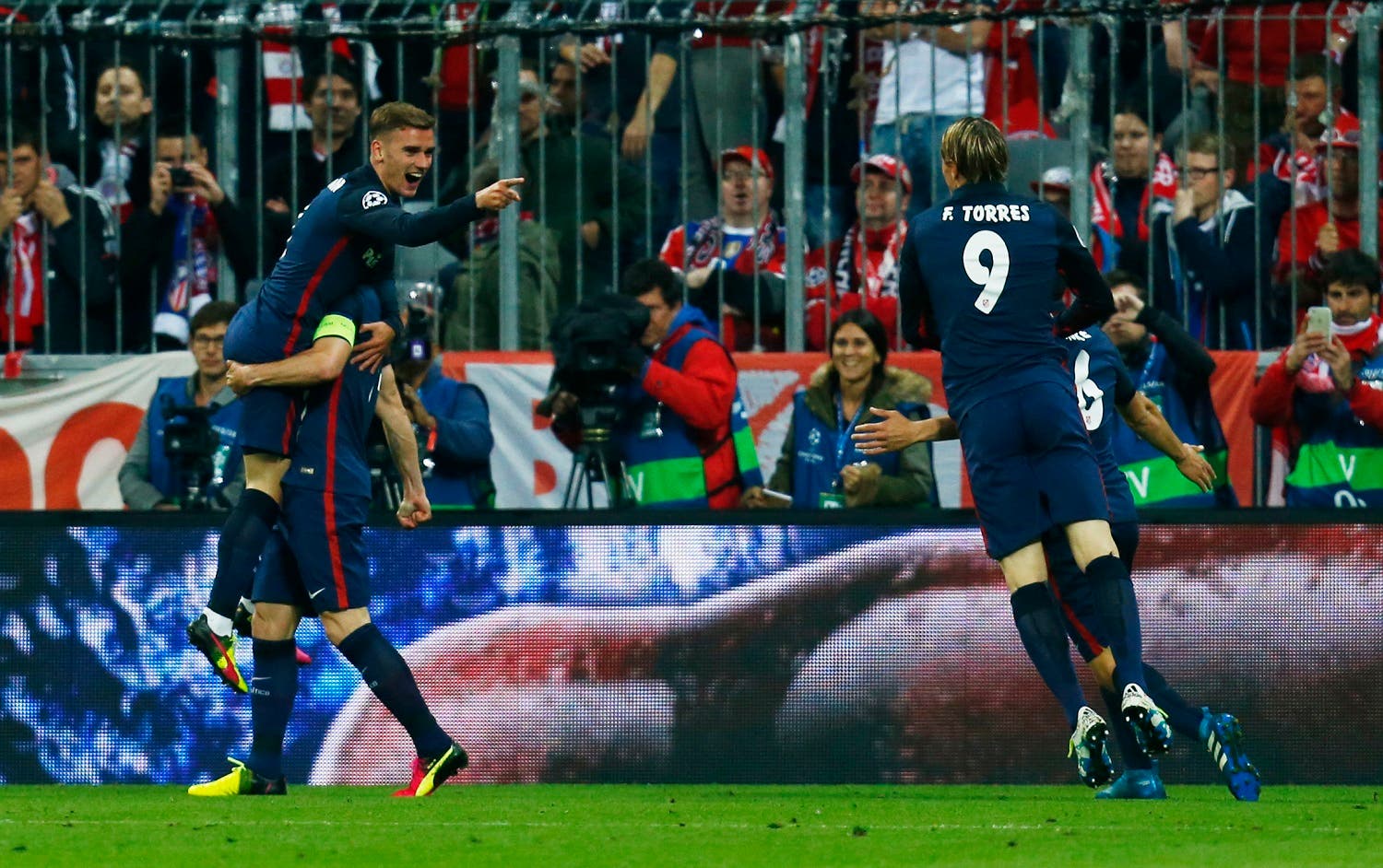 Atletico Madrid's Antoine Griezmann celebrates scoring their first goal. (Reuters)