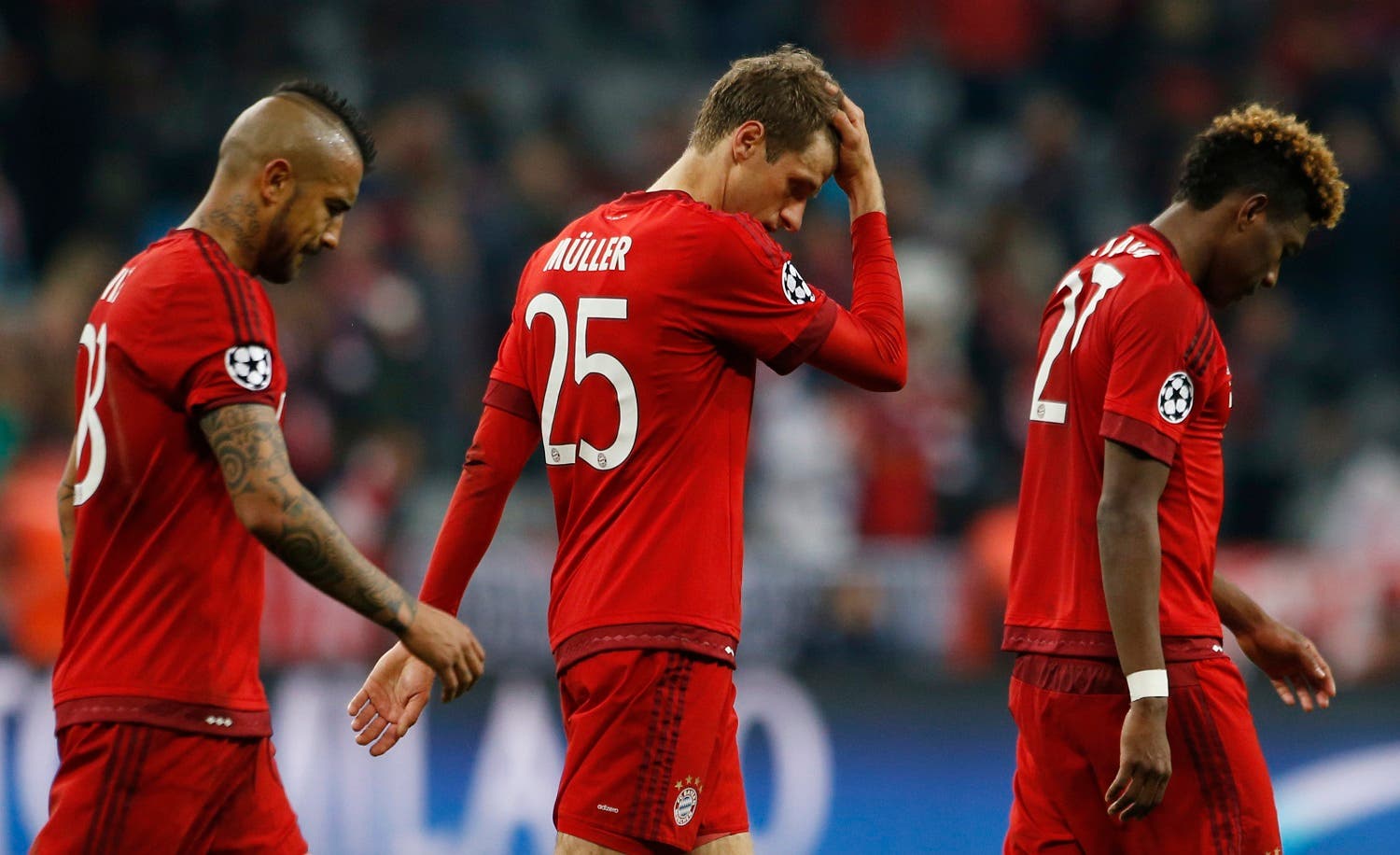 Bayern Munich's Arturo Vidal, Thomas Muller and David Alaba look dejected after the game Reuters