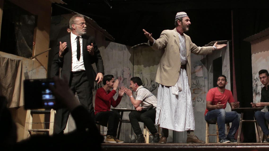 In this Thursday, April 28, 2016 photo, Palestinian actors perform a Gaza version of Shakespeare's Romeo and Juliet play on the stage of a cultural center in Gaza City. (AP)