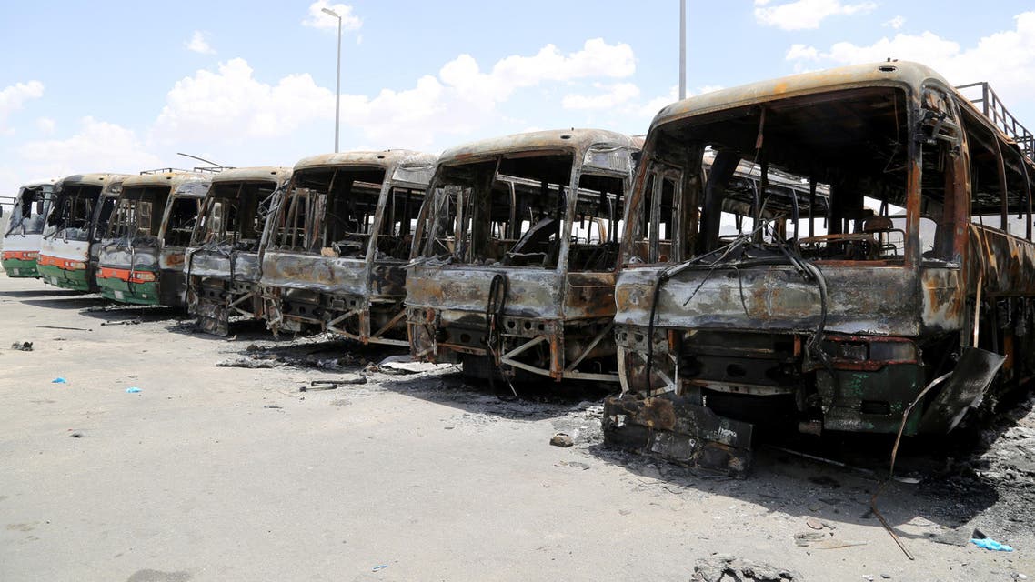 Buses, which witnesses said were burnt by workers from construction company Saudi Binladin Group in a protest over delayed wages, are seen in Makkah, Saudi Arabia May 1, 2016. (Reuters)
