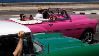  Kim in Cuba: Kardashians roam Havana in hot pink convertible