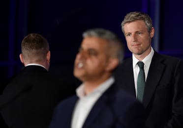 Zac Goldsmith, Britain's Conservative Party candidate for Mayor of London (R) and Paul Golding, Mayor of London candidate for Britain First (L), react as Britain's Labour Party candidate for Mayor of London Sadiq Khan speaks following his victory in the London mayoral election at City Hall in London, Britain, May 7, 2016. REUTERS/Toby Melville 