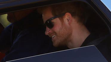Britain's Prince Harry rides in the back of an SUV during a driving event at the Invictus Games in Orlando, Florida, U.S., May 7, 2016. (Reuters)