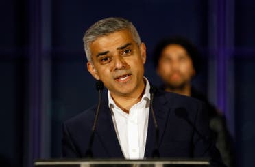 Sadiq Khan speaks on the podium after hearing the results of the London mayoral elections, at City Hall in London, Saturday, May 7, 2016. (AP Photo/Kirsty Wigglesworth)