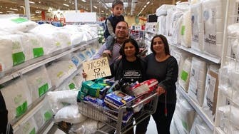 ‘Now it is our turn’: Syrian refugees aid Canadians displaced by wildfire 
