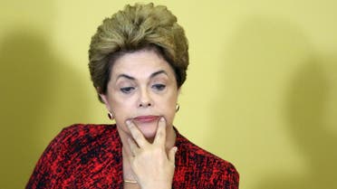 Brazil's President Dilma Rousseff reacts as she attends a signing ceremony for new universities, at Planalto Palace in Brasilia, Brazil, May 9, 2016. REUTERS