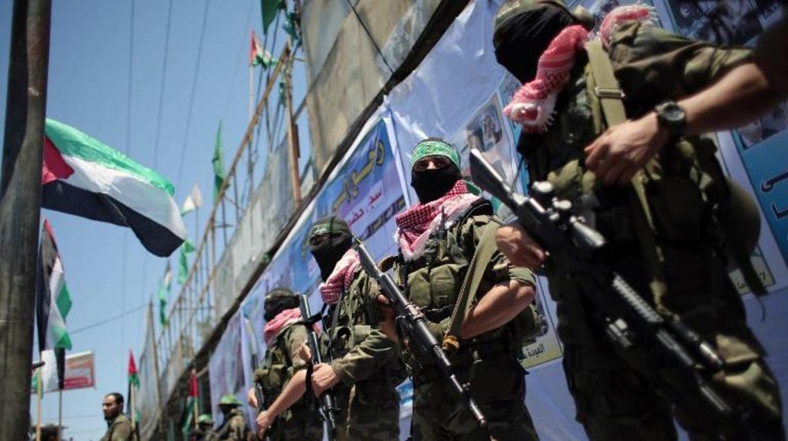 Palestinian militants of the Ezzedine al-Qassam Brigades, Hamas' armed wing, take part in a parade in the southern Gaza Strip town of Rafah on May 17, 2015 to mark the 67th anniversary of the "Nakba". AFP