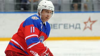 Putin on ice: Russian President shows off hockey skills