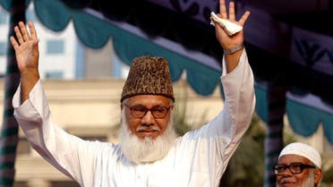 Moulana Motiur Rahman Nizami, chief of the Jamaat-e-Islami, Bangladesh's biggest Islamic Political Party and an alliance of the ruling Bangladesh Nationalist Party, waves to his supporters during a rally in Dhaka REUTERS