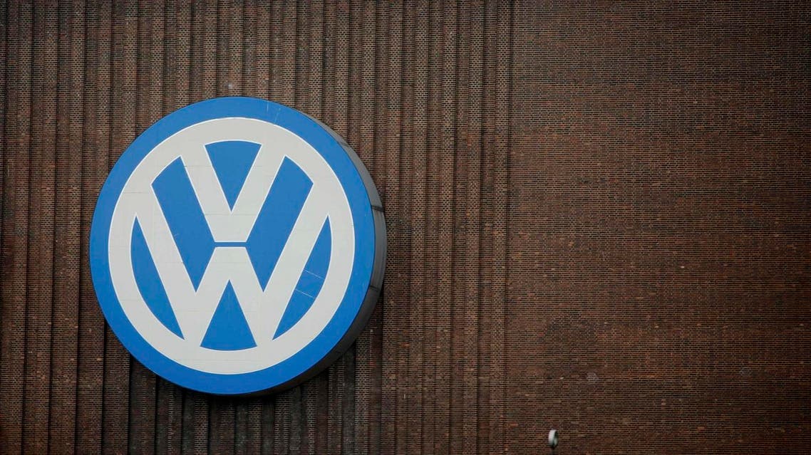 A worker walks on the roof of a Volkswagen production site in Wolfsburg, Germany, April 28, 2016. REUTERS