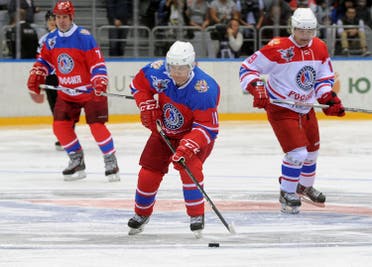 Russian President Putin takes part in gala game of the Night Ice Hockey League in Sochi. (Reuters)