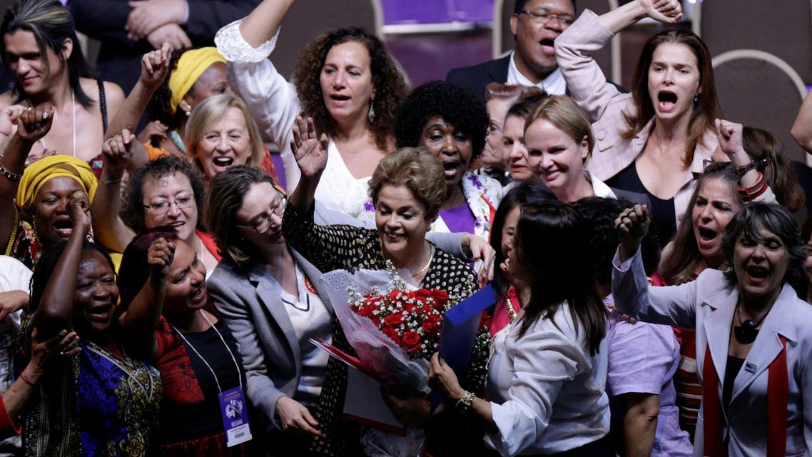 Brazil's President Dilma Rousseff (C) greets supporters during the opening ceremony of the National Policy Conference for Women in Brasilia, Brazil, May 10, 2016. REUTERS/Ueslei Marcelino
