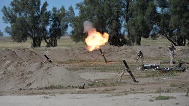 Iraqi soldiers fire a mortar toward Islamic State militants on the outskirts of Fallujah. (Reuters)