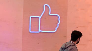 A man passes a light installation during a press preview of the "Facebook Innovation Hub" in Berlin on February 24, 2016. (AFP)