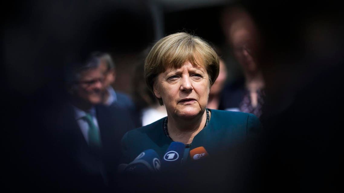 German Chancellor Angela Merkel briefs the media after she visited a European project day at the Lycee Francais school in Berlin, Germany, Tuesday, May 3, 2016. (AP)