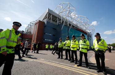 General view of police outside the stadium after the match was abandoned Reuters / Andrew Yates Livepic 