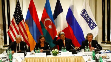 Russian Foreign Minister Sergei Lavrov, left, Armenia's President Serzh Sargsyan, second left, U.S. Secretary of State John Kerry, center, and President Ilham Aliyev of Azerbaijan, right, attended the meeting in Vienna. (AP)