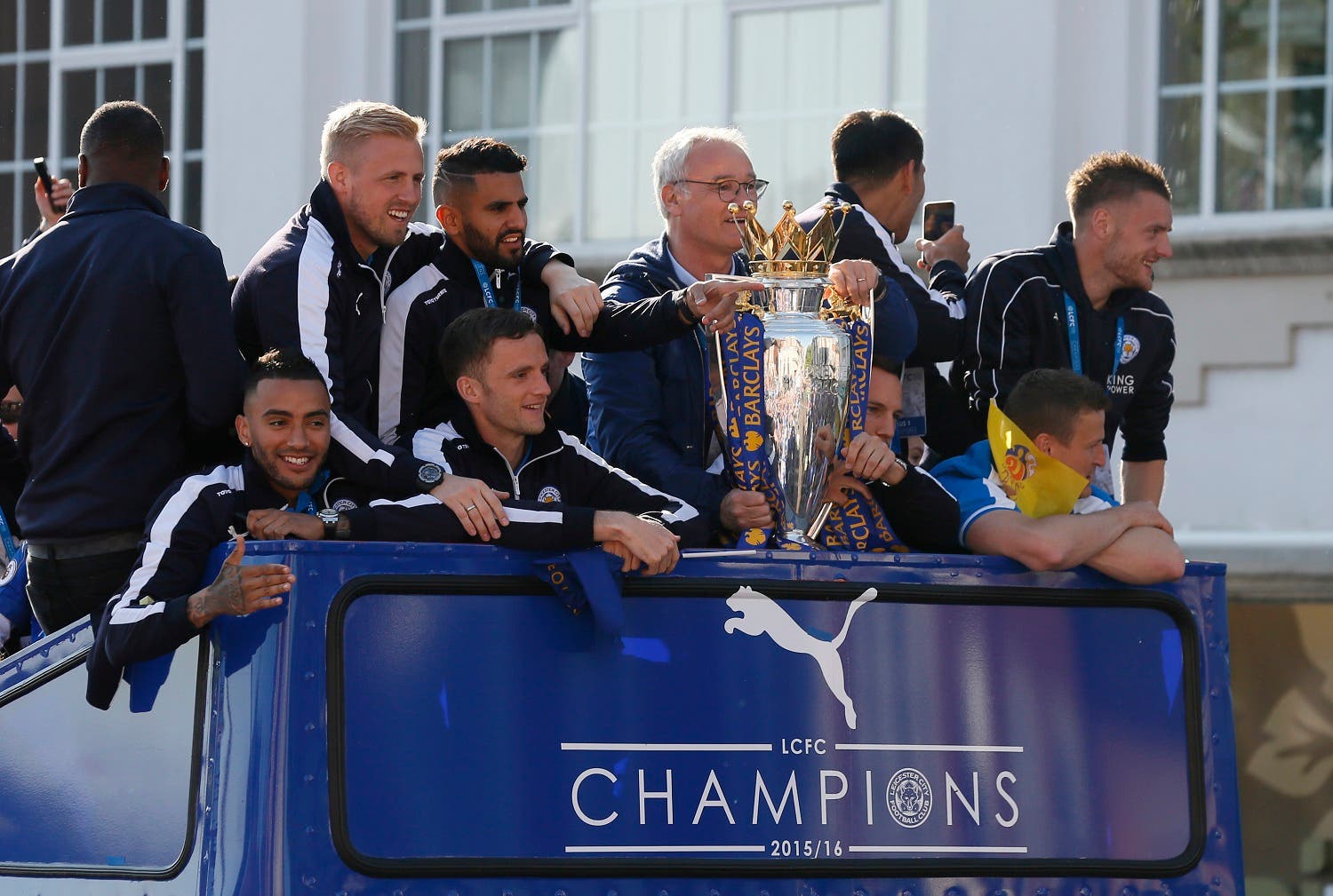 Leicester City manager Claudio Ranieri, Kasper Schmeichel, Riyad Mahrez, Andy King, Danny Simpson, Danny Drinkwater, Jamie Vardy and Robert Huth celebrate with Premier League trophy during the parade. (Action Images via Reuters)