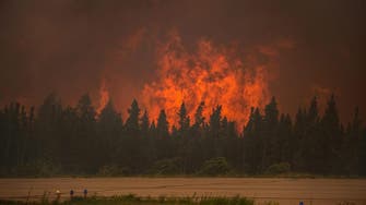 Canada wildfire rages on near oil sand facilities