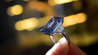 Oppenheimer blue diamond sells for record $57.5 million