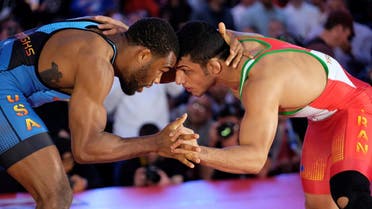 Olympic champion Jordan Burroughs grappled with Iran’s Asian champion Peyman Yarahmadi in the 74kg freestyle. (Reuters)