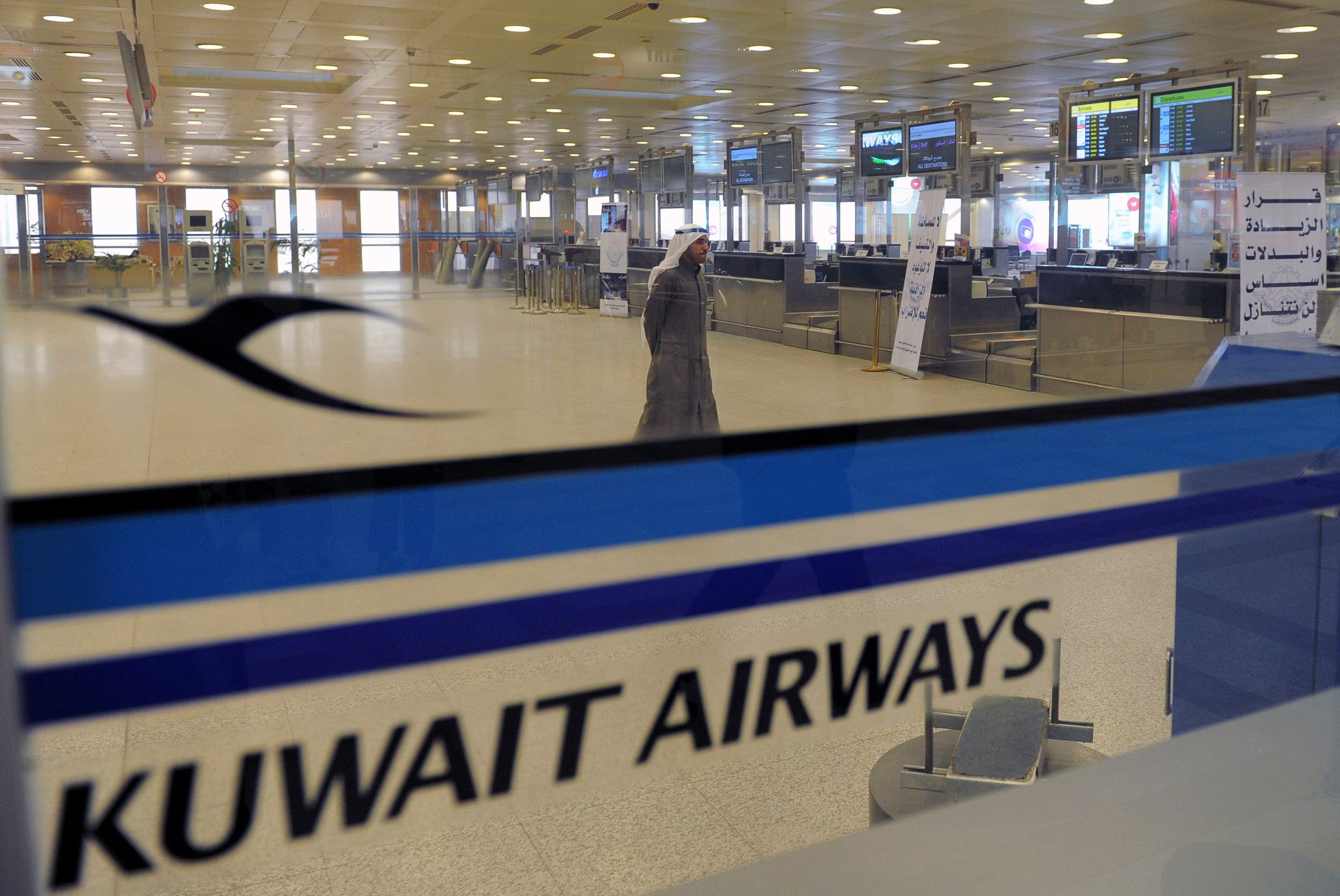 View of empty Kuwait Airways check-in counters at Kuwait Airport on Sunday, March 18, 2012. AP