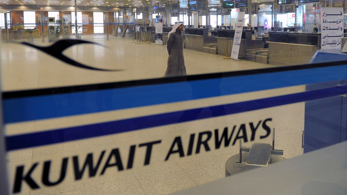 View of empty Kuwait Airways check-in counters at Kuwait Airport on Sunday, March 18, 2012. AP