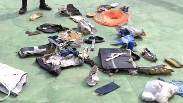 An image grab from Egypt's military on May 21, 2016 shows some debris that the search teams found in the sea after the EgyptAir Airbus A320 crashed in the Mediterranean. (AFP)