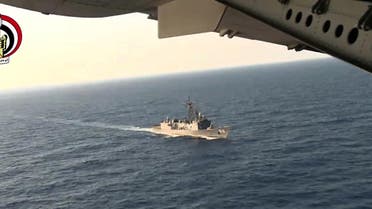In this Thursday, May 19, 2016 video image released by the Egyptian Defense Ministry, an Egyptian plane flies over an Egyptian ship during the search in the Mediterranean Sea for the missing EgyptAir flight 804 plane. (AP)
