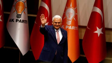 Turkey's next prime minister and incoming leader of the ruling AK Party Binali Yildirim greets party members during a meeting in Ankara, Turkey, May 19, 2016. (Reuters)