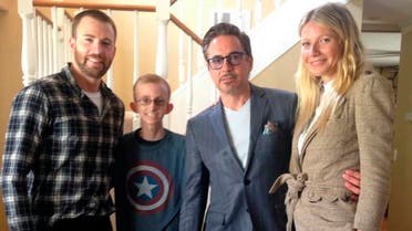 Iron Man Robert Downey Jr. joined Captain America Chris Evans to visit 18-year-old Ryan Wilcox at his home in Southern California. (AP)