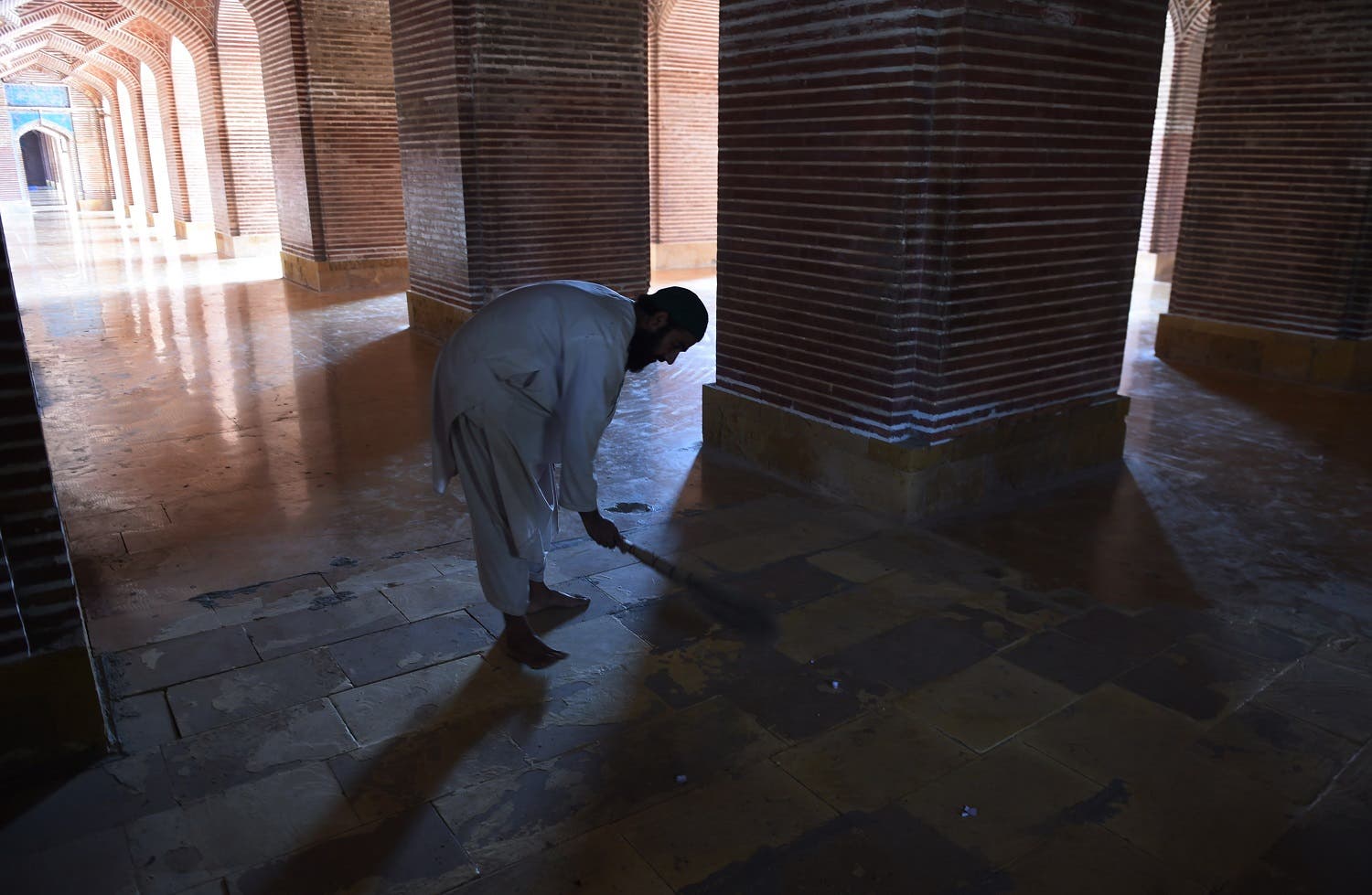 Completed in 1647 by thousands of labourers, the Shah Jahani mosque is a rare example of Pakistan's Mughal heritage outside of the country's cultural centre of Lahore. (AFP)