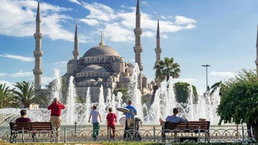 Tourists admiring the view of the fountain and Blue Mosque in Istanbul, Turkey. (Shutterstock)