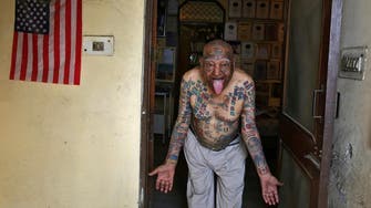 Indian man removes teeth and gets over 500 tattoos