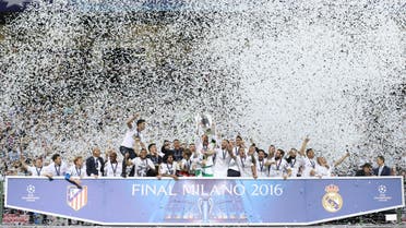 Real Madrid's Sergio Ramos lifts the trophy as they celebrate winning the UEFA Champions League. (Reuters)