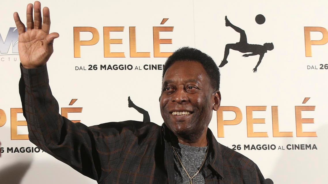 Brazilian soccer legend Edson Arantes Do Nascimiento better known as 'Pele', gestures during a photocall of the movie 'Pele', in Milan, Italy, Wednesday, May 25, 2016. (AP)