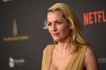 Gillian Anderson arrives at The Weinstein Company and Netflix Golden Globes afterparty on Sunday, Jan. 10, 2016, at the Beverly Hilton Hotel in Beverly Hills, Calif. (Photo by Chris Pizzello/Invision/AP)