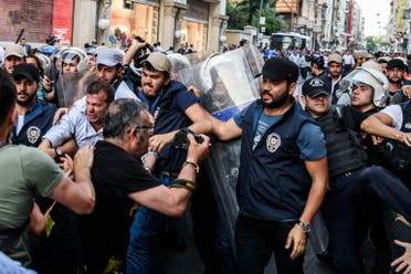 Protestors and Turkish anti-riot police clash on May 31, 2016 in Istanbul, during a demonstration commemorating the third anniversary of the start of the Gezi Park protests. (AFP)