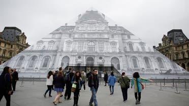 Visitors gather in front of the entrance of the Musee de Louvre which is closed and tourists being turned away, due to the unusually high water level of the nearby river Seine in Paris, Friday, June 3, 2016. (Photo: AP)