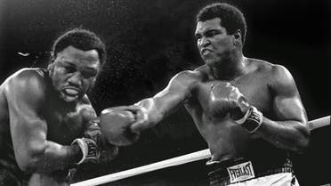 Spray flies from the head of challenger Joe Frazier as heavyweight champion Muhammad Ali connects with a right in the ninth round of their title fight in Manila, Philippines, October 1, 1975. (Photo: AP)