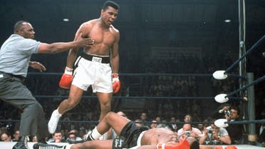 In this May 25, 1965, file photo, heavyweight champion Muhammad Ali is held back by referee Joe Walcott, left, after Ali knocked out challenger Sonny Liston in the first round of their title fight in Lewiston, Maine. Ali, the magnificent heavyweight champion whose fast fists and irrepressible personality transcended sports and captivated the world, has died according to a statement released by his family Friday, June 3, 2016. He was 74. (AP)