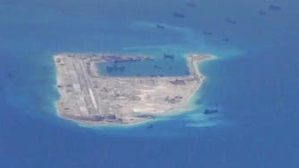 US targets Chinese individuals, firms over island building in South China Sea